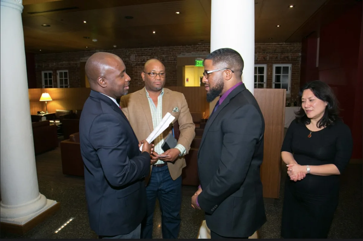 Sherman in conversation at a professional event