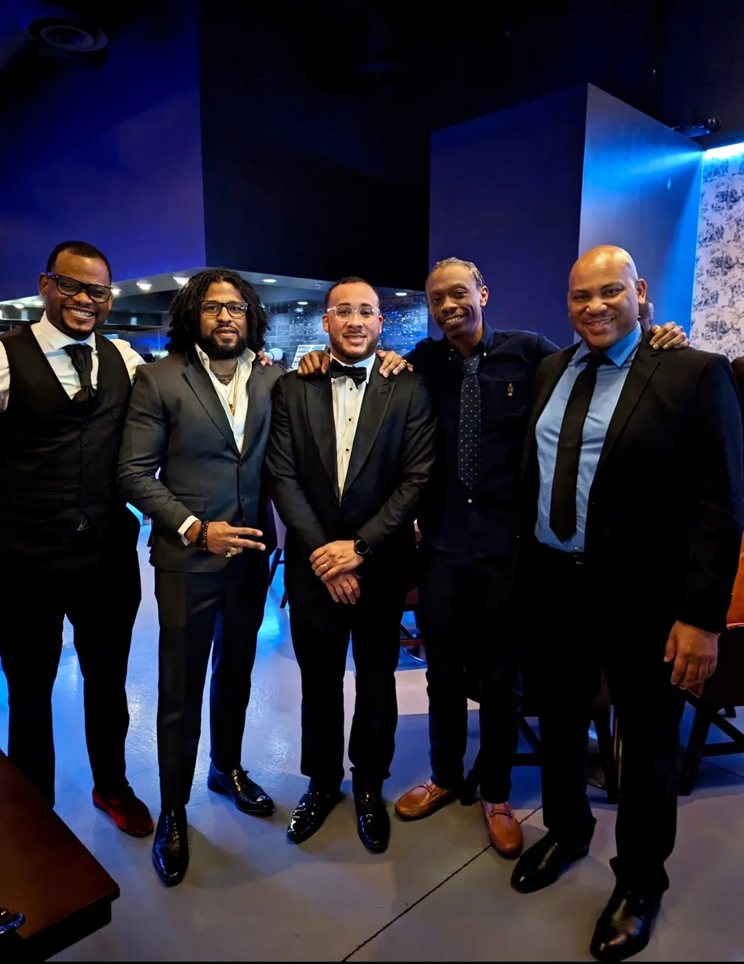 Sherman with colleagues at an event